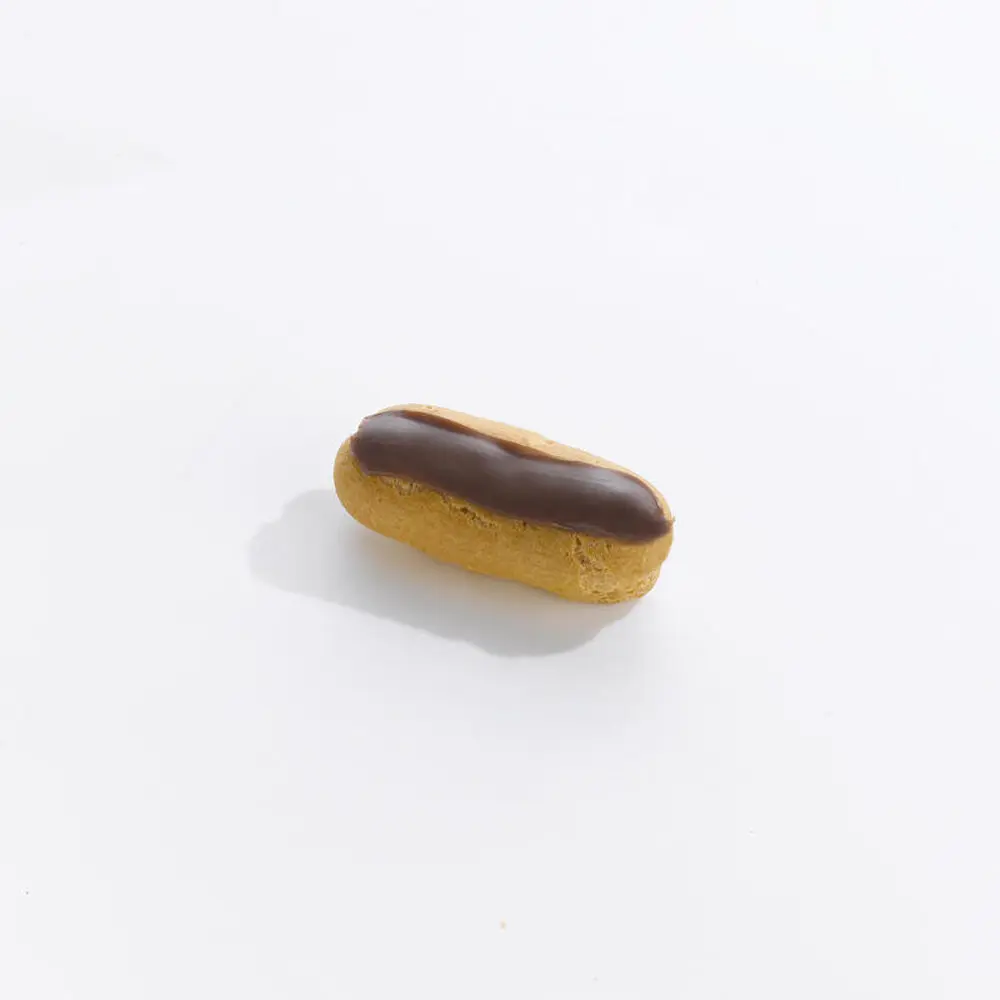 Joriba Eclair mignon met C.P. en choco topp. 60st